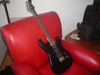 1986 E squier black headstock no pickguard2.JPG