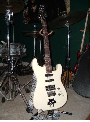 1986 E squier black headstock no pickguard3.JPG